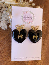 Load image into Gallery viewer, Elegant Black &amp; Gold Heart Stud Dangles
